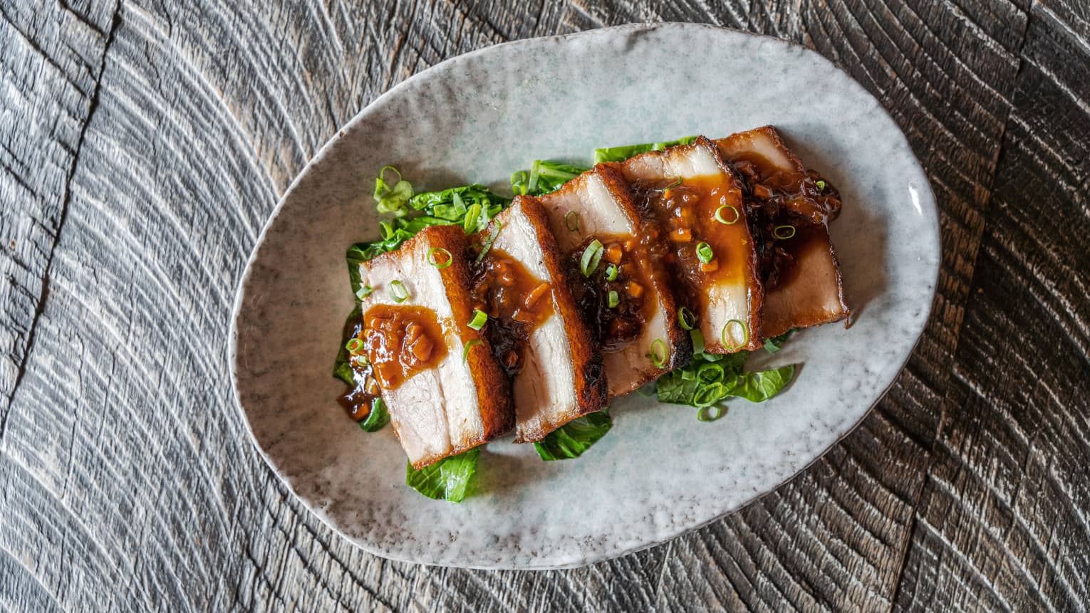 Thit Heo Quay ? Crispy Pork with Bok Choy, Coriander and Black Spicy Sauce