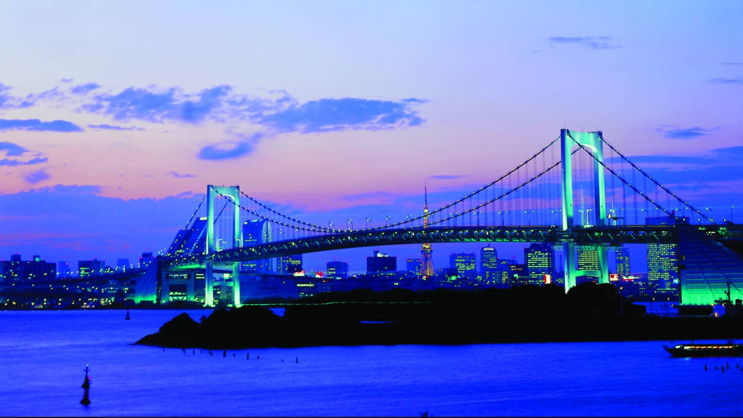 Tokyo Bay bridge over water at dusk