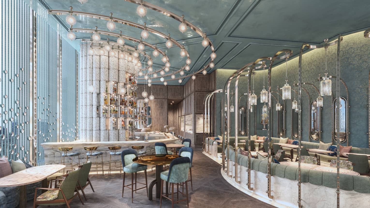 A bar with curved bar counter, high top chairs, curved track lighting on ceiling