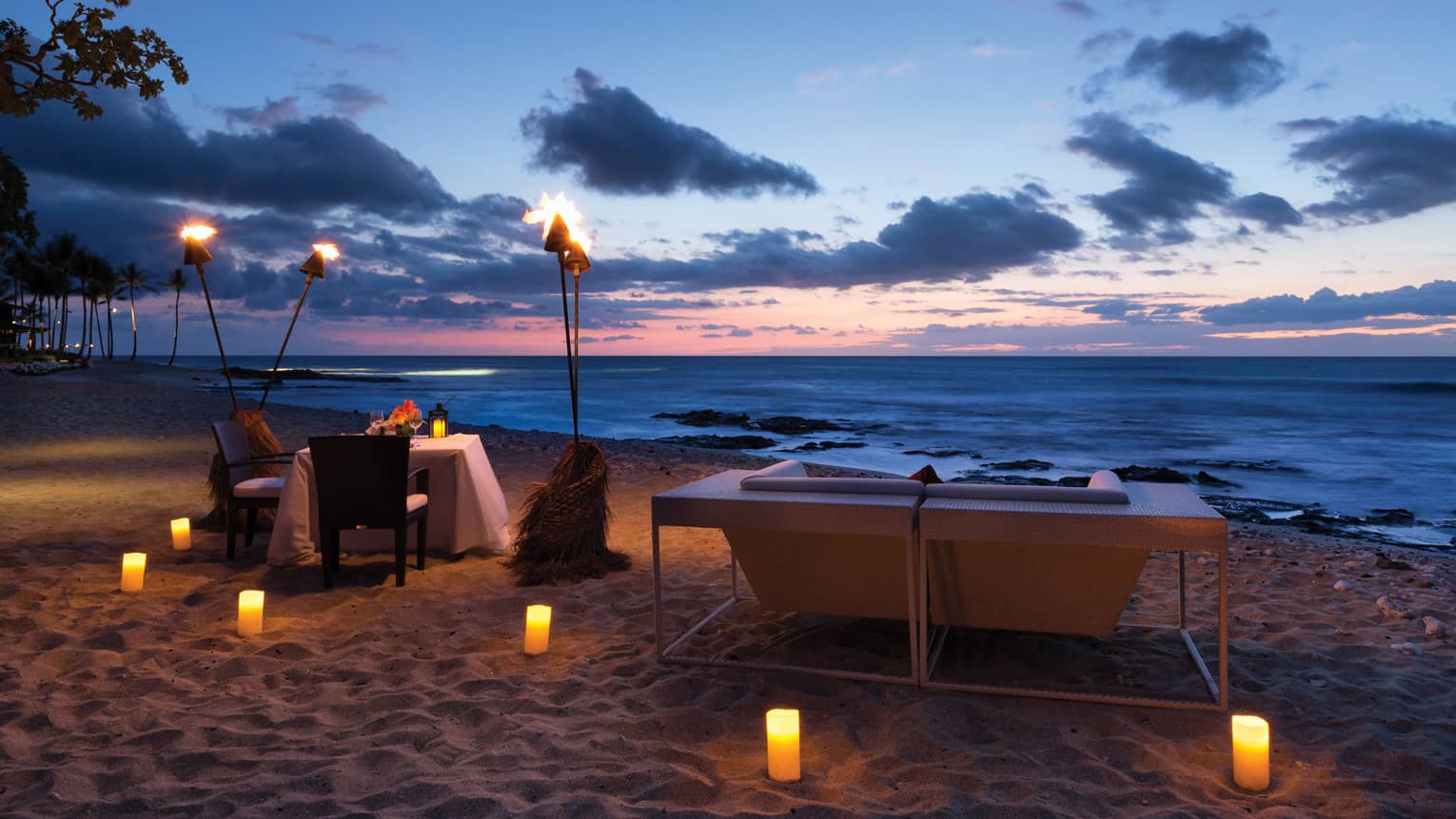 Restaurants In Kona Ocean Side Lounges Four Seasons Hualalai Torches Over Dining Table On Beach At Night Glowing Candles In The Sand