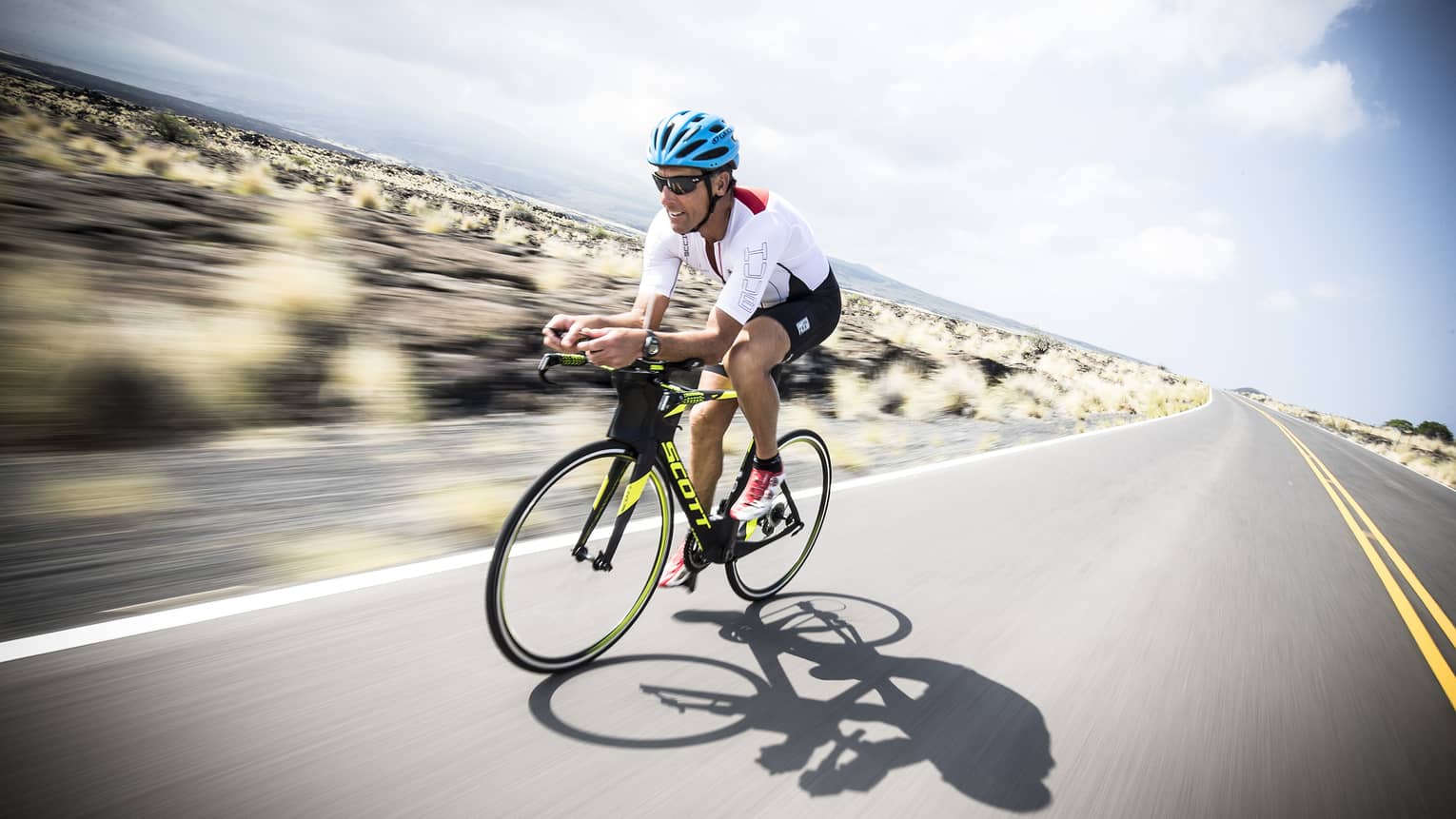 Dave Scott Triathlon camp biker on a Hualalai road
