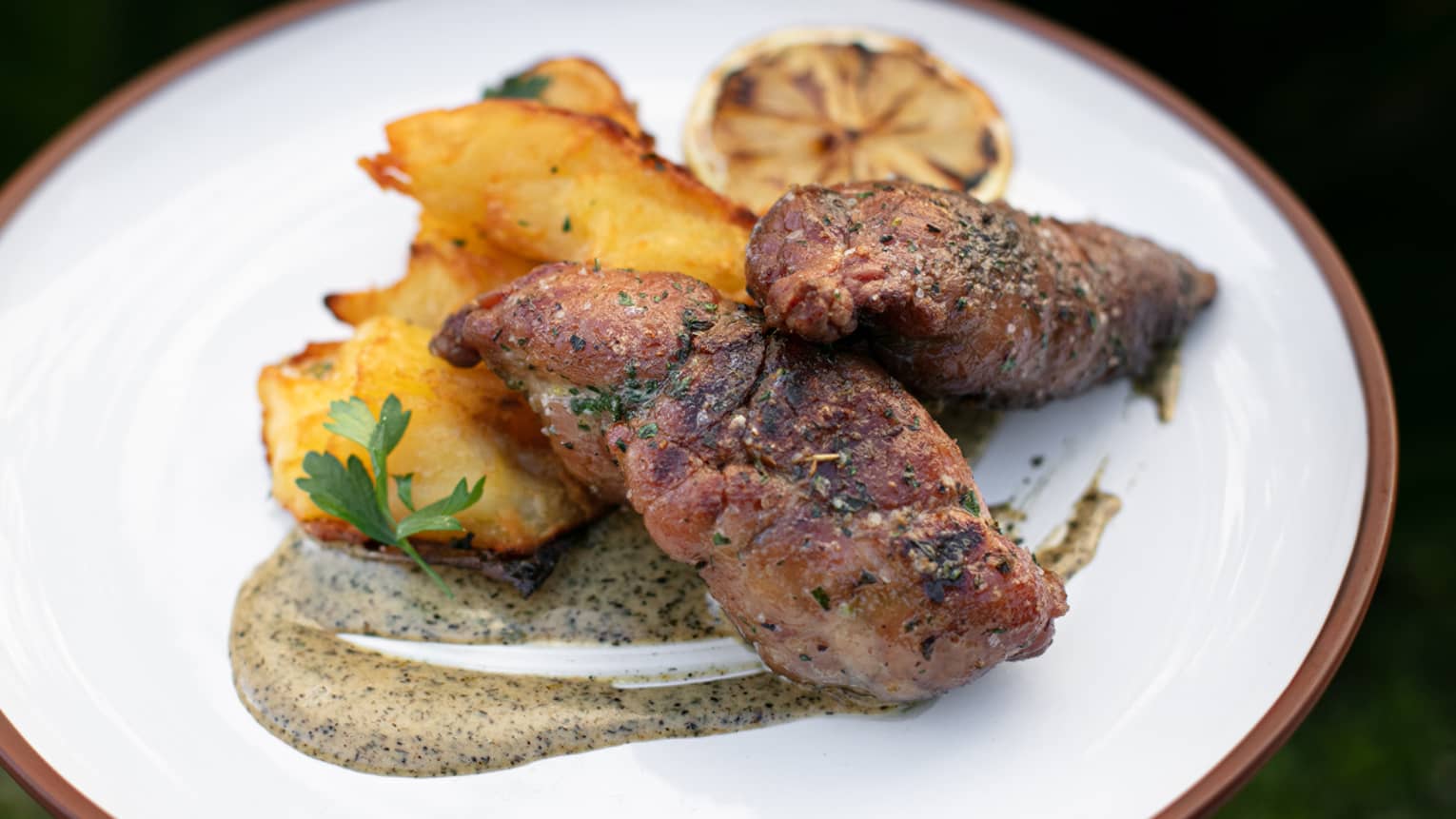 Sweetbreads topped with lemon pickled in olive oil.