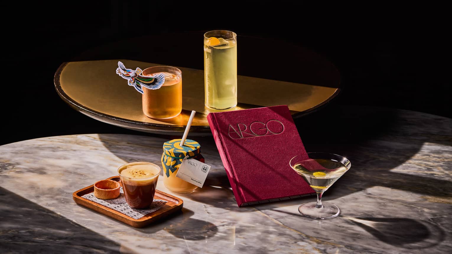 Drinks displayed on a stand on a bar