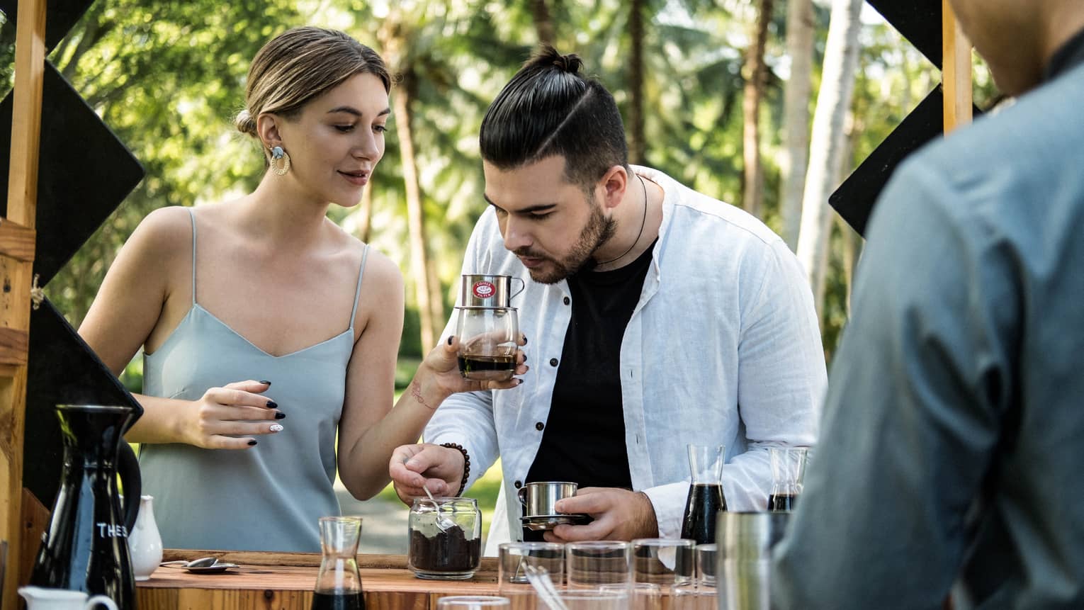 A couple participates in a coffee tasting session