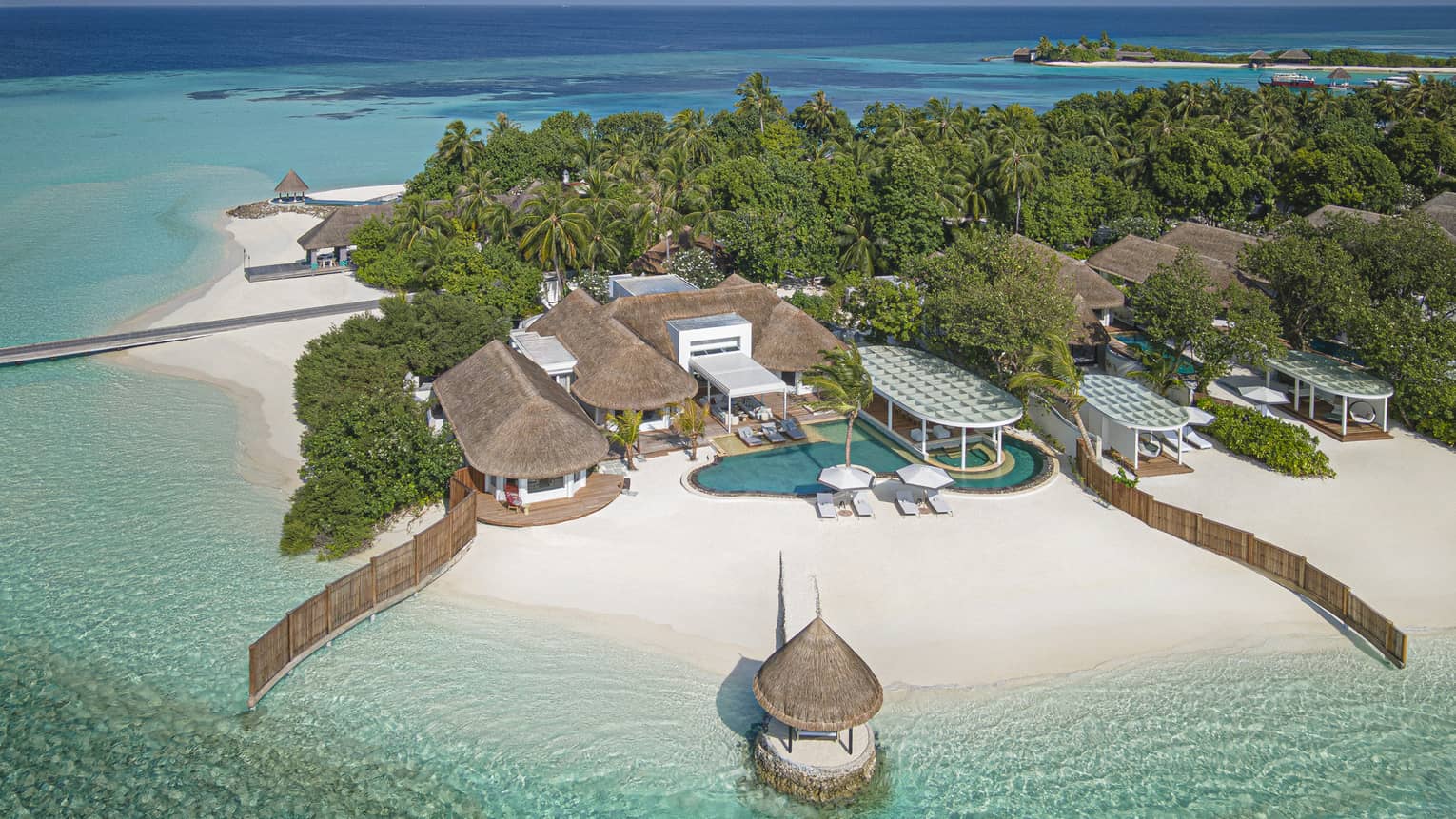 Aerial view of three-bedroom luxury villa on beach in Maldives