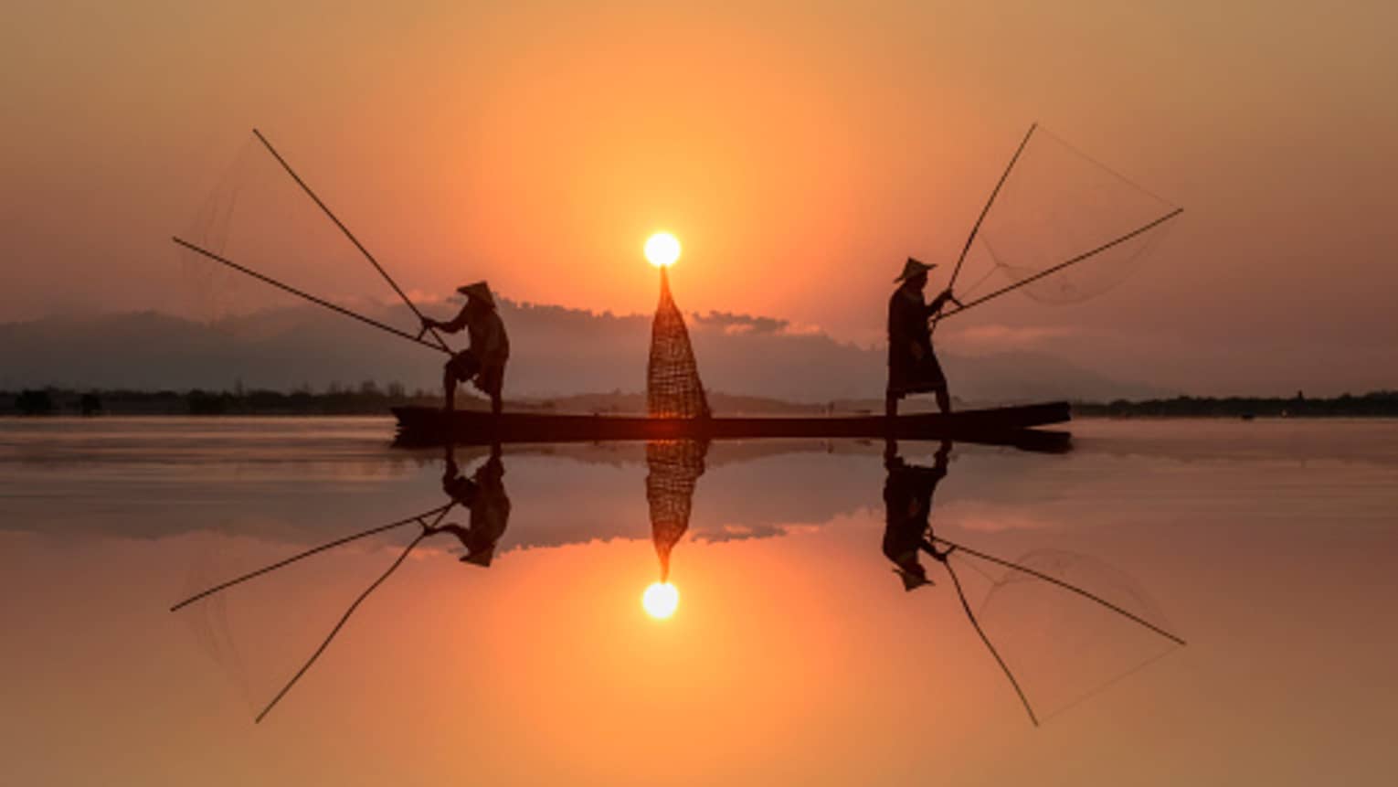 Fisherman fishing in Mekong river, Thailand 