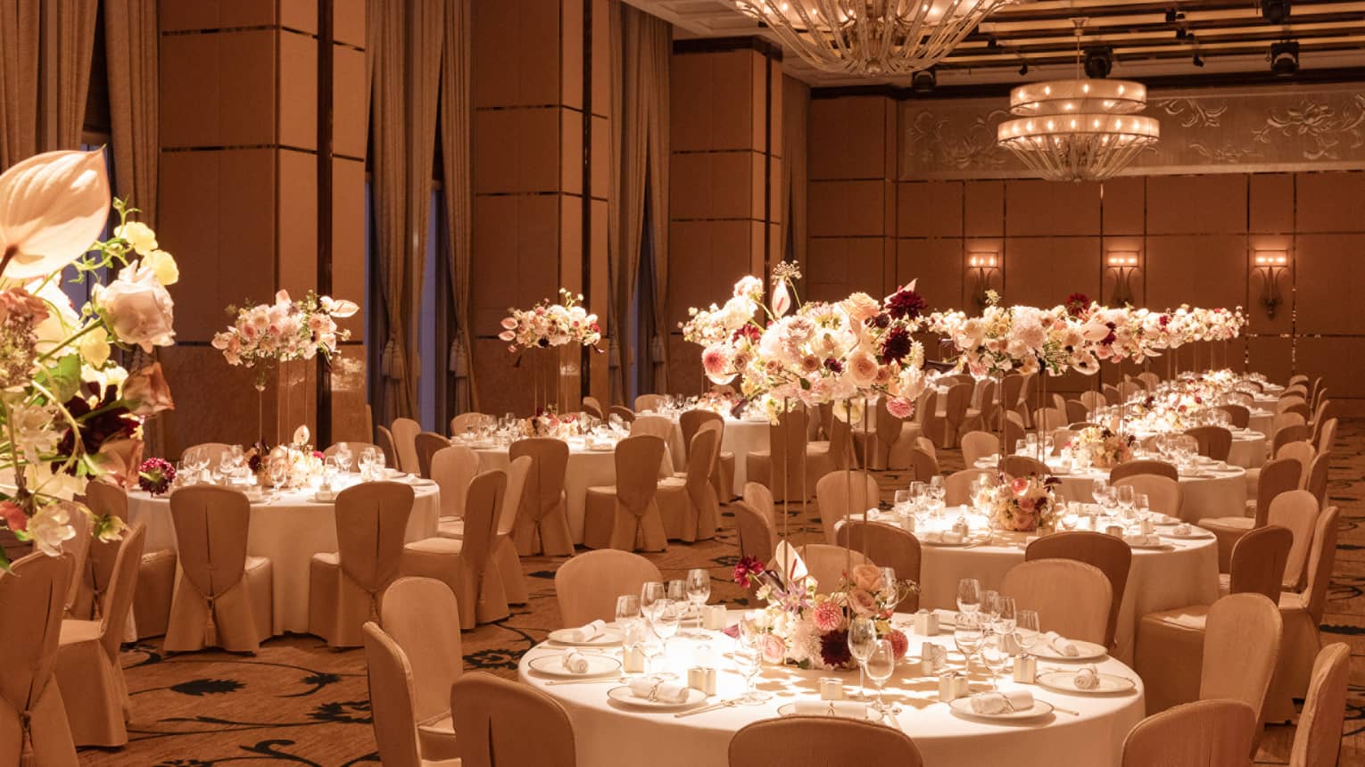 Grand indoor ballroom set for wedding