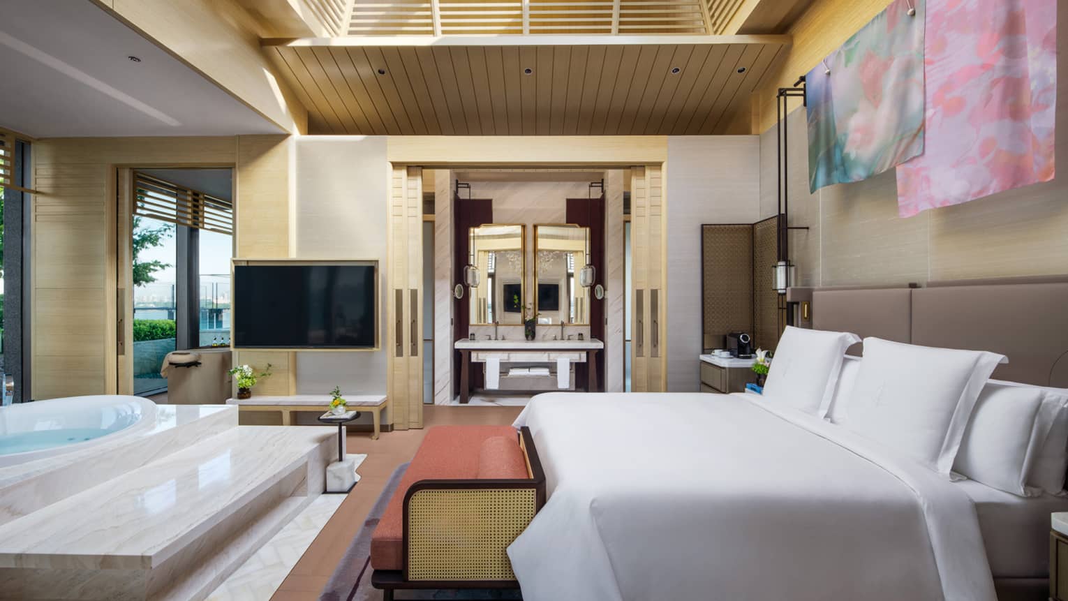 Luxury bedroom with sky-lit ceiling and standalone tub near the king bed ? Penthouse Suite at Four Seasons Hotel Suzhou