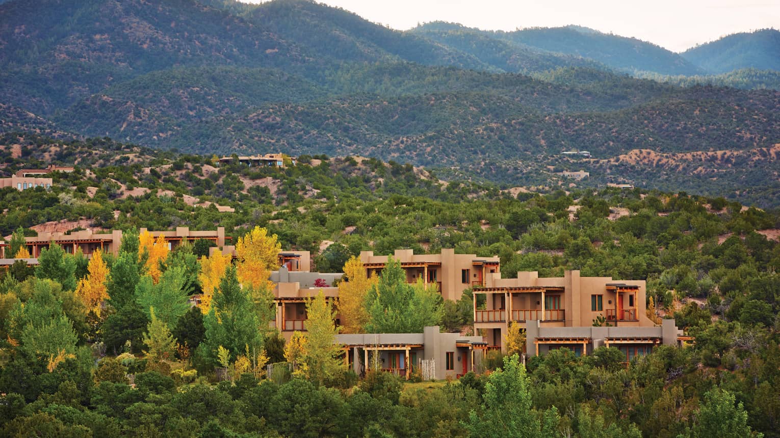 Aerial view of Four Seasons Resort Santa Fe in desert mountains