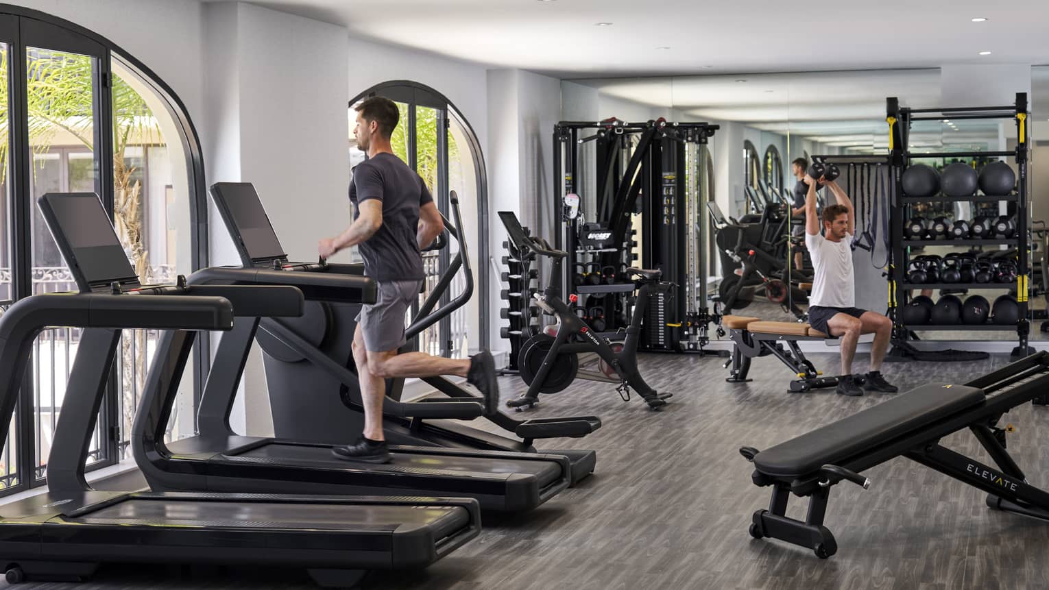 People exercising in a fitness centre.