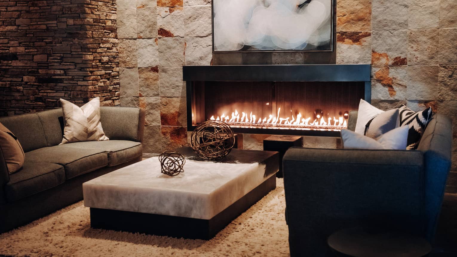 Living room with couches and fireplace