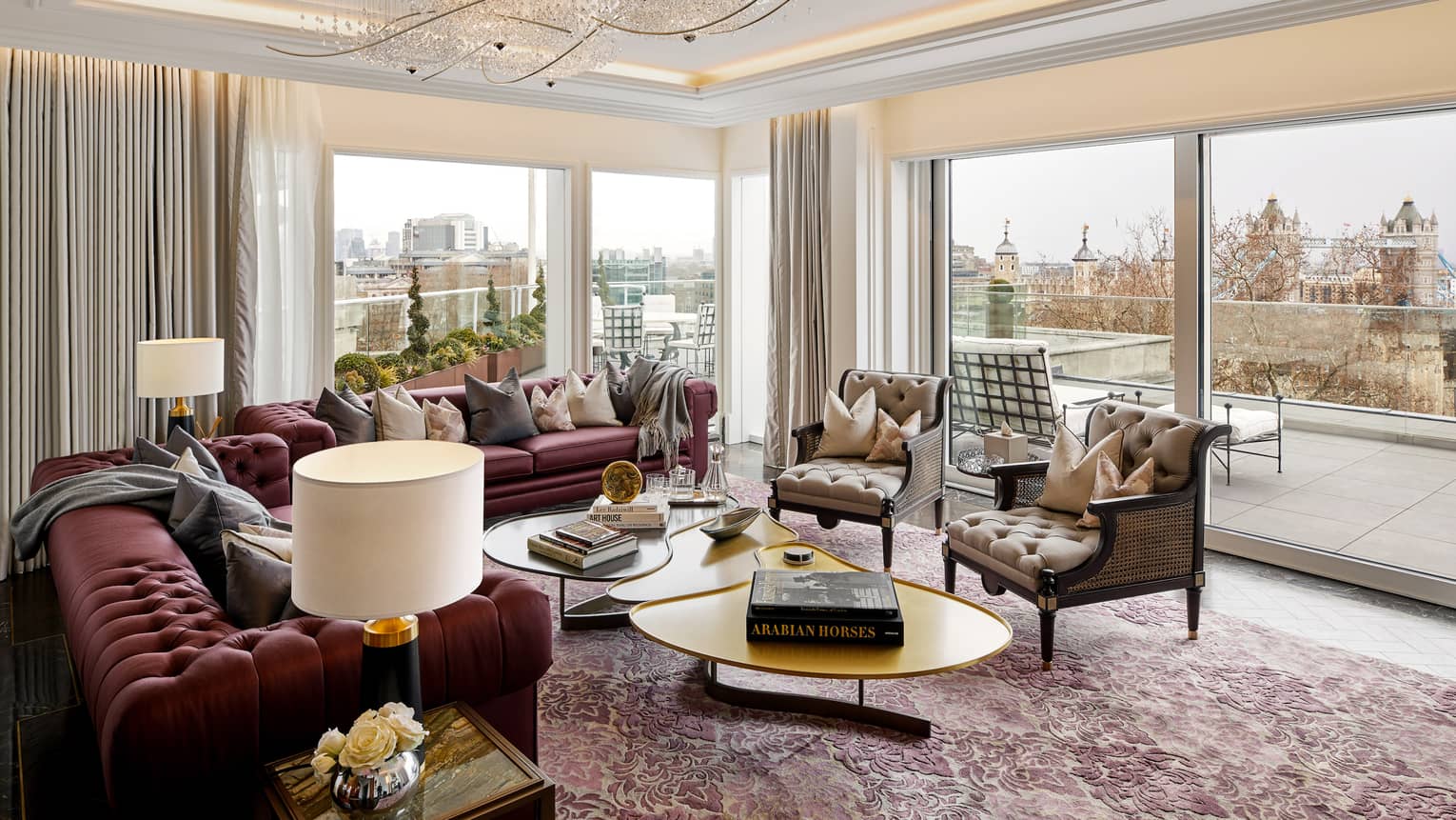 Residence living area and terrace, with views of Tower Bridge through the window