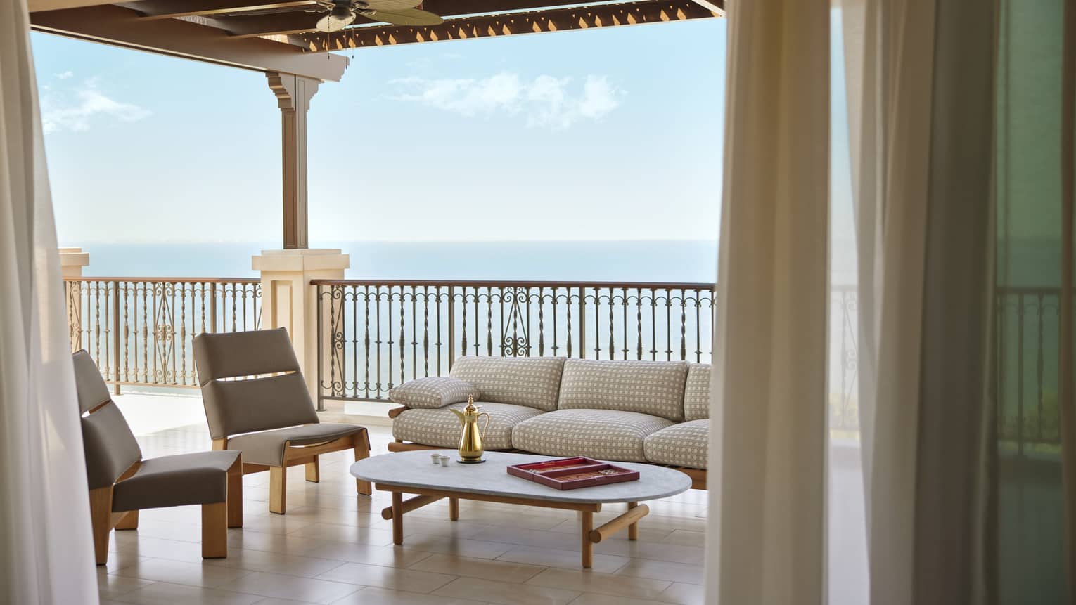 Covered terrace of luxury hotel suite with sea view
