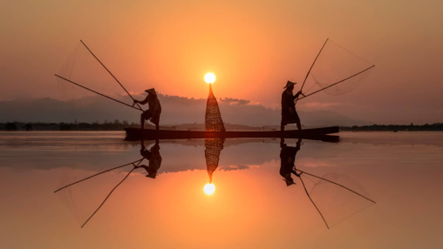 Fisherman fishing in Mekong river, Thailand 