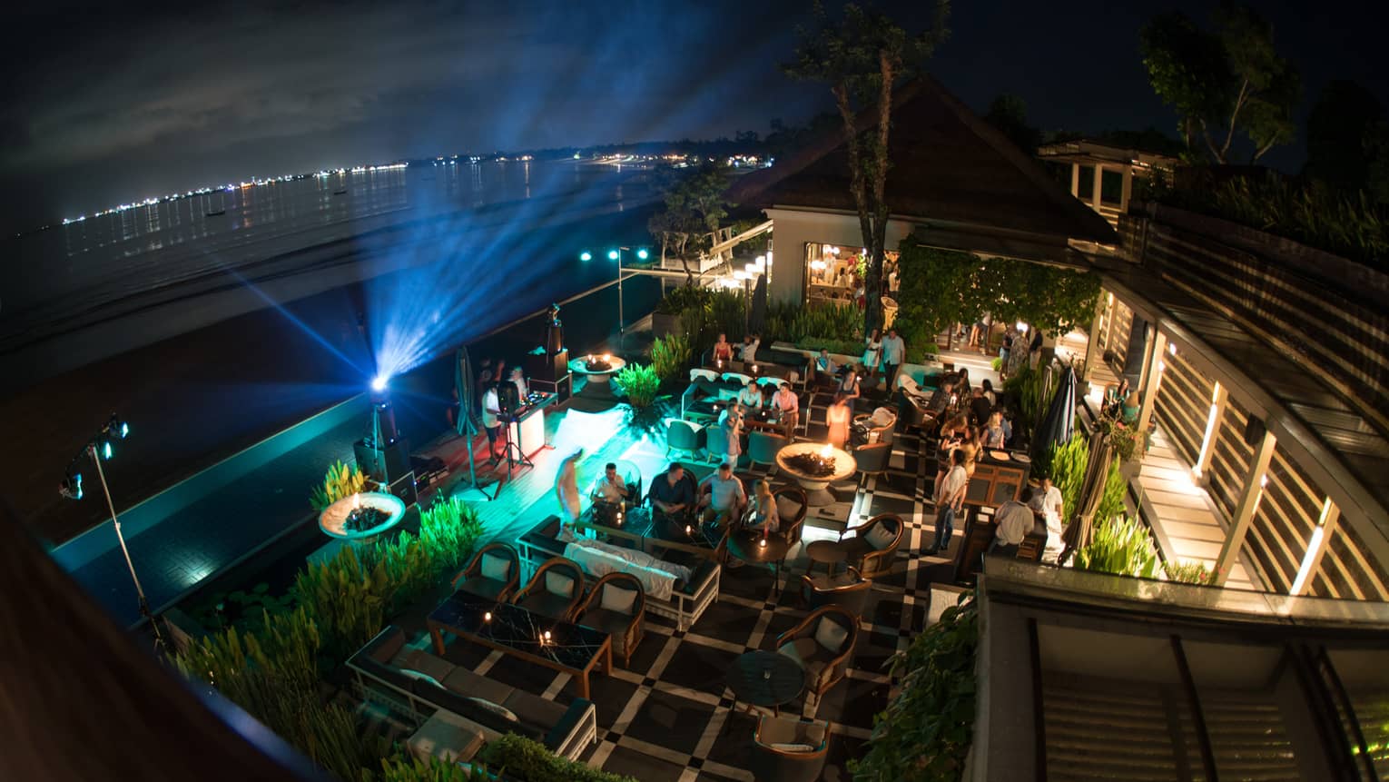 CEO Circle event happening outside at night at Four Seasons Bali