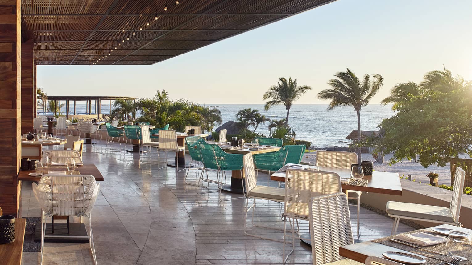 Dining tables along Dos Catrinas restaurant patio 