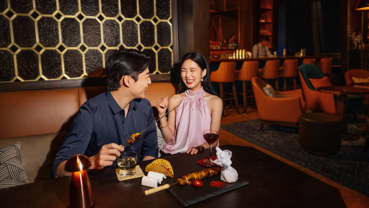Man and woman enjoying a meal in Harbour Bar