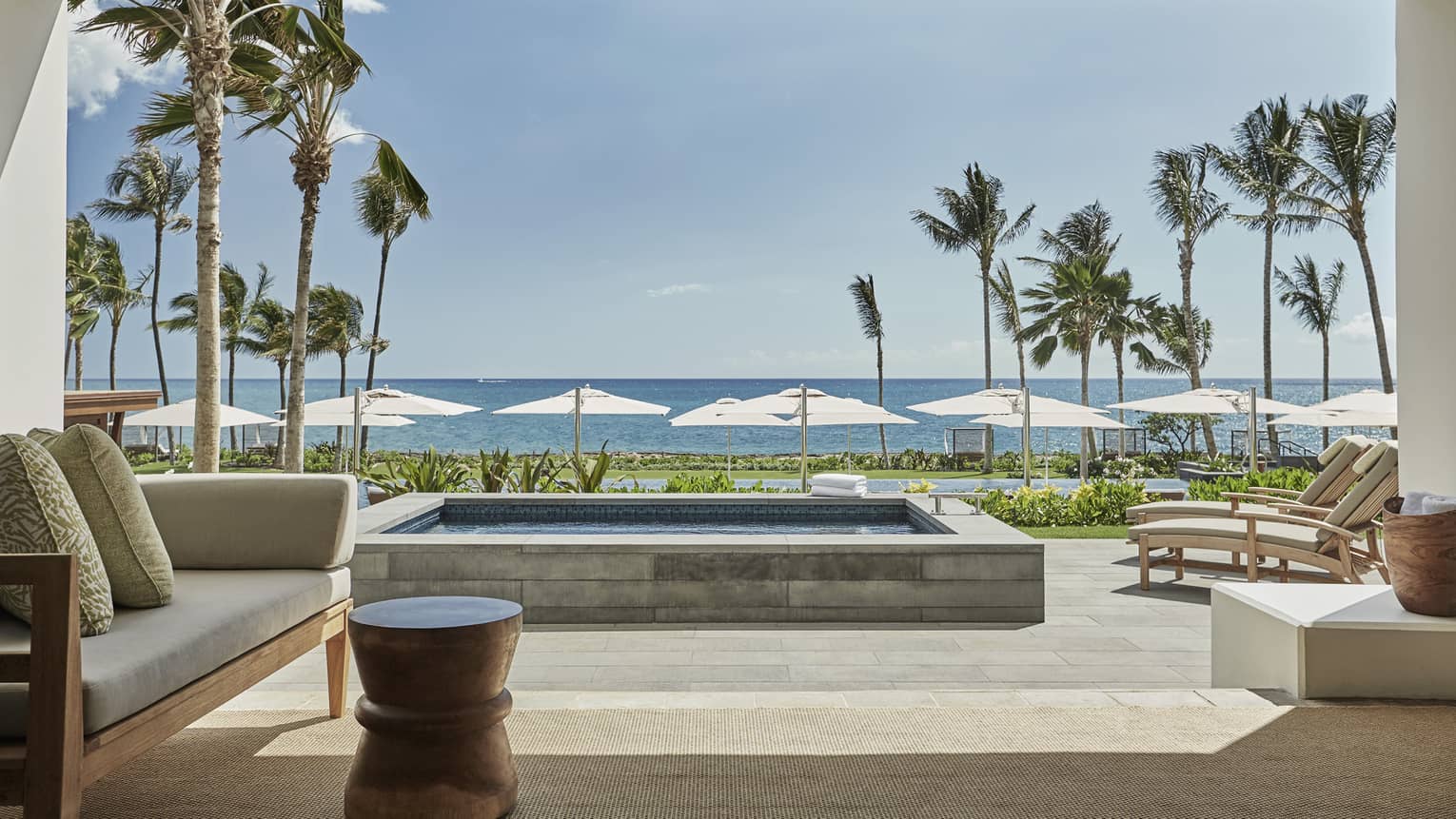 Ko Olina Hotel Oahu Luxury Resort Four Seasons Pacific Suite Open To Wall Patio With Stone Plunge Pool Lounge Chairs Ocean