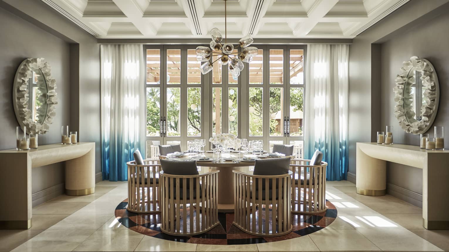 Modern wood chairs around table, glass lantern chandelier in Noe private dining room