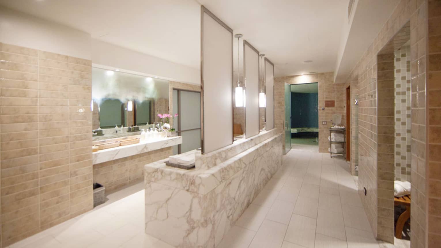 Long white marble spa change room