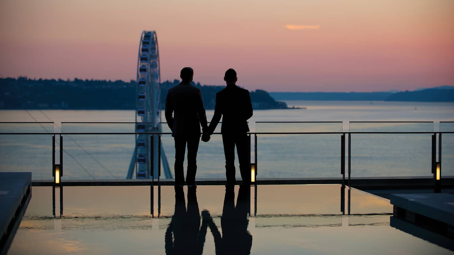 This image depicting two people holding hands and relates to ESG at Four Seasons and advancing diversity, inclusion and belonging at Four Seasons.