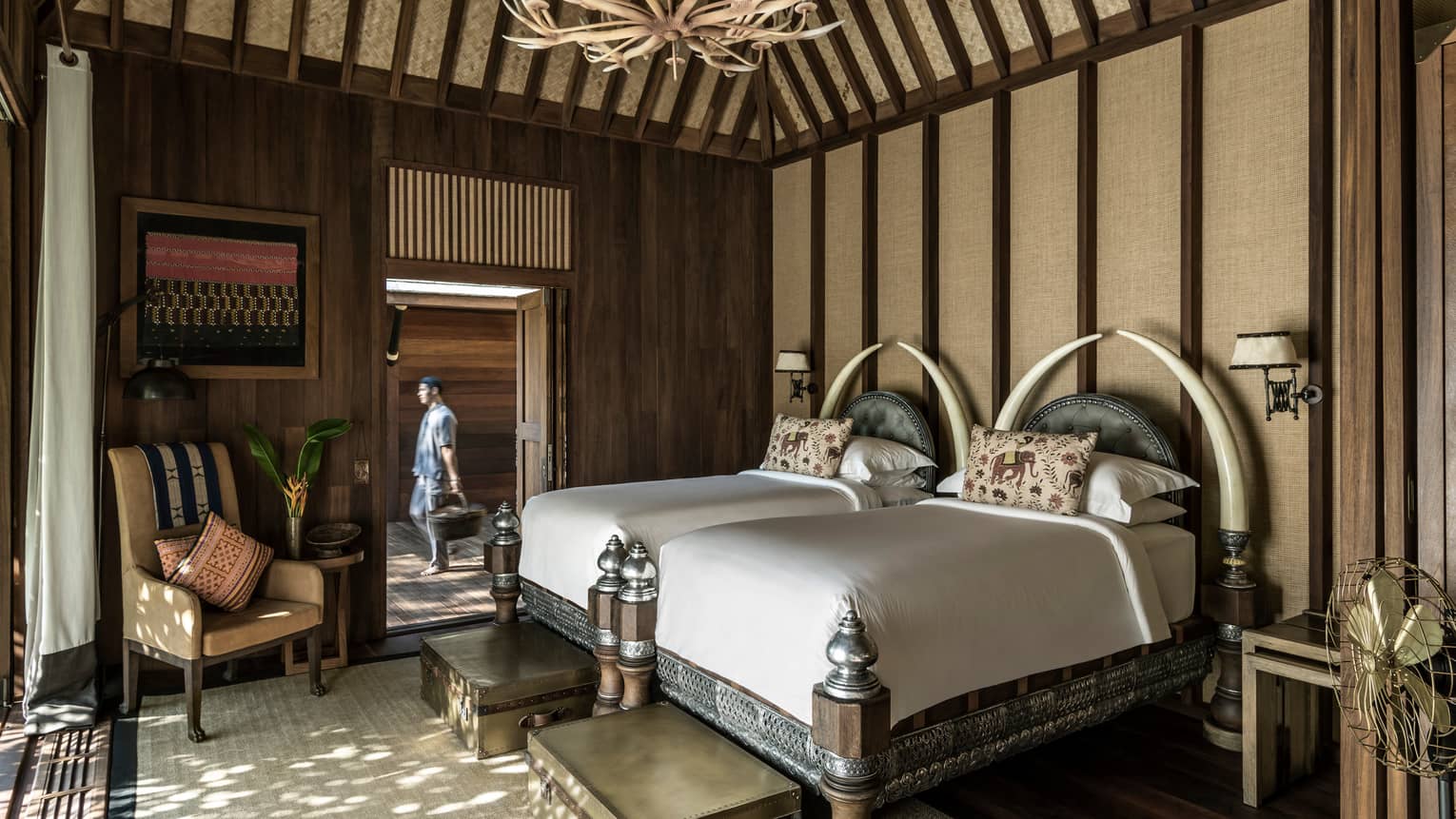 Luxury Camping In Thailand Four Seasons Golden Triangle Explorer S Lodge Double Beds Under Wood Chandelier Man Walking Down Adjoining Hallway