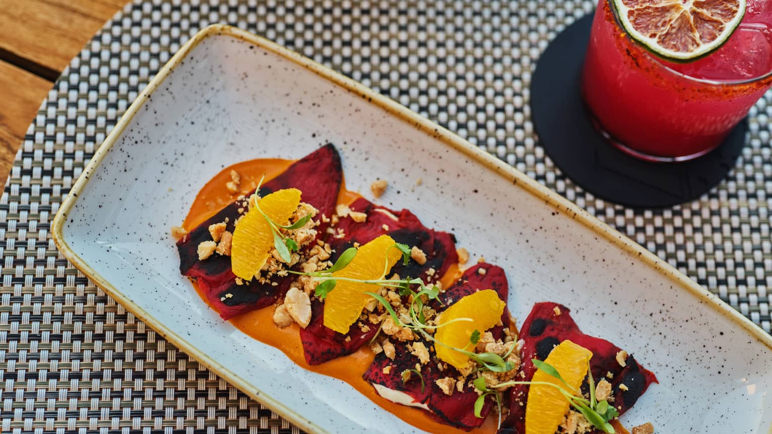Piquillo Peppers dish and red cocktail