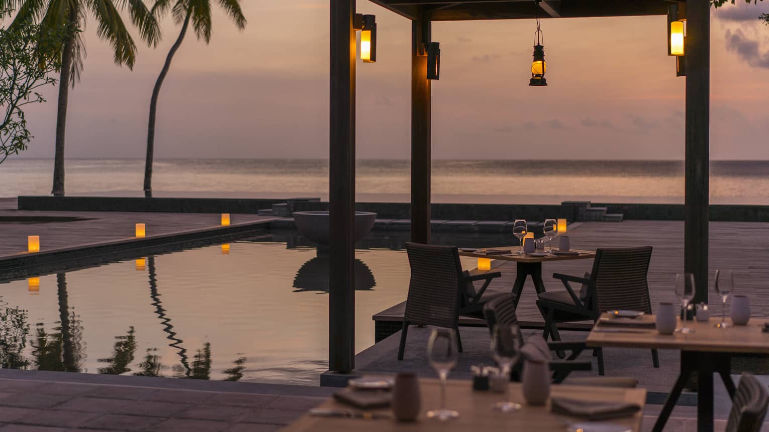 Claudine restaurant water views and exterior illuminated at night