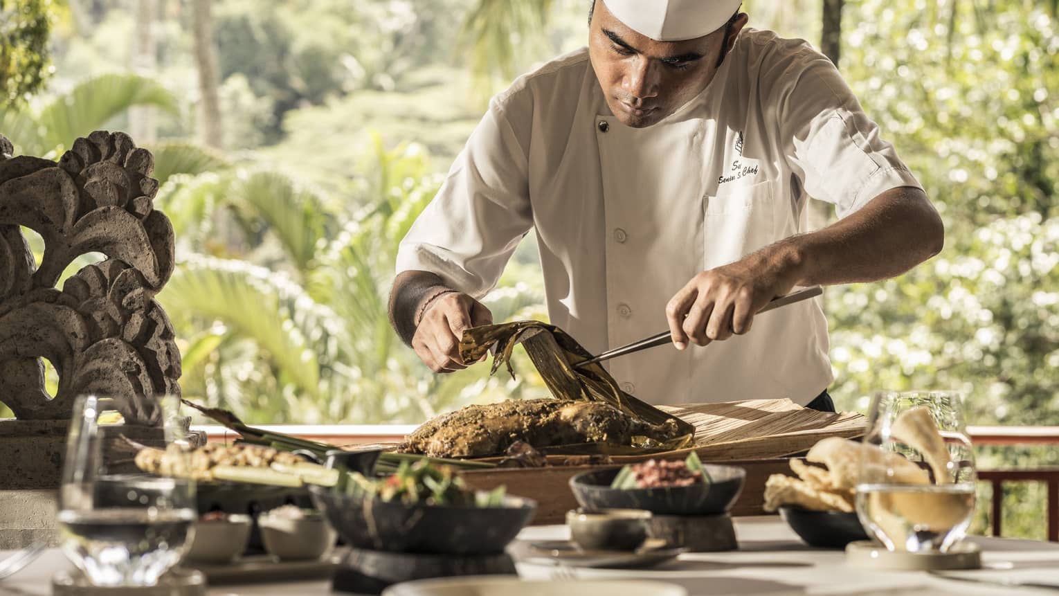 Chef Suta expertly preparing a dish 