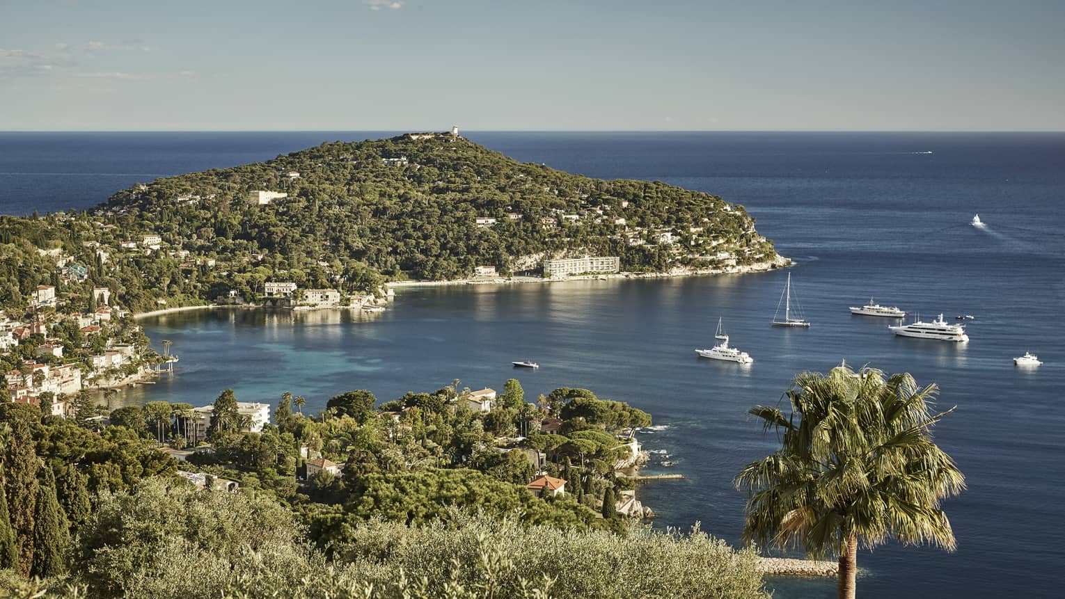 A variety of boats exploring a harbor in Cote d'Azur