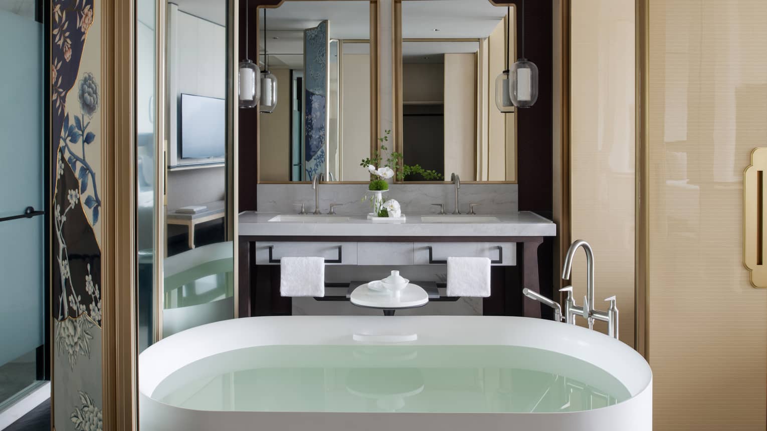 Luxury hotel bathroom with standalone tub at Four Seasons Hotel Suzhou