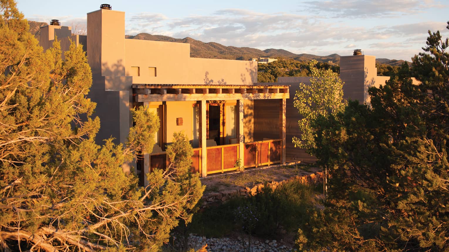 Deluxe Casita single-storey Southwestern-style building exterior on desert mountain