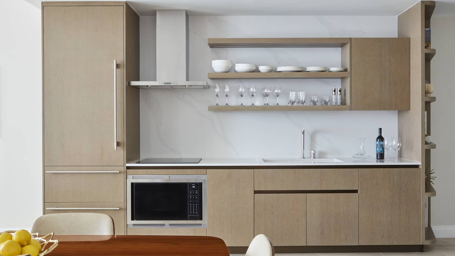 Kitchen with fridge, oven, sink and open shelves