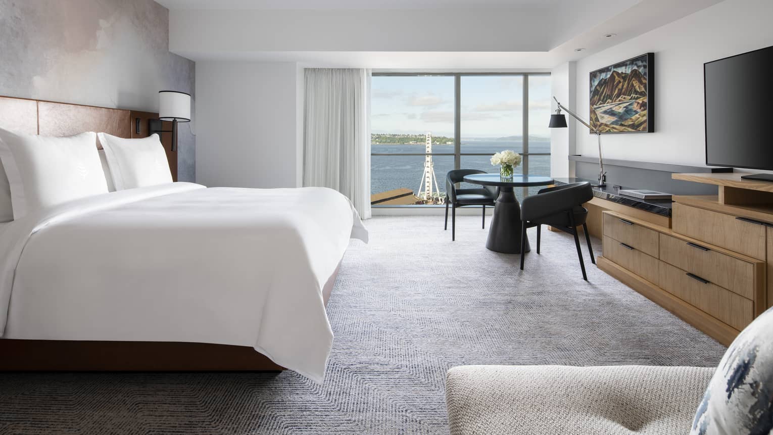 Deluxe Bay-View Rooms offer views of Elliott Bay through floor-to-ceiling windows