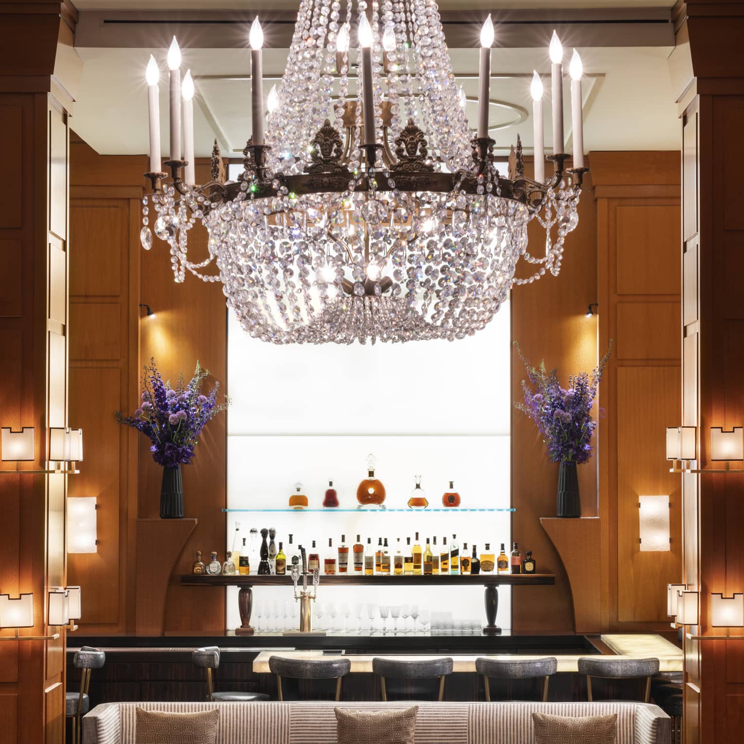 Indoor hotel bar with large crystal chandelier