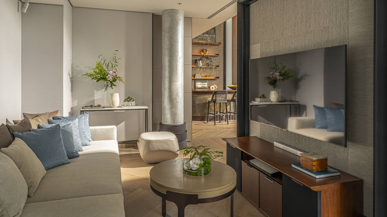 Sofa, coffee table and wall-mounted TV