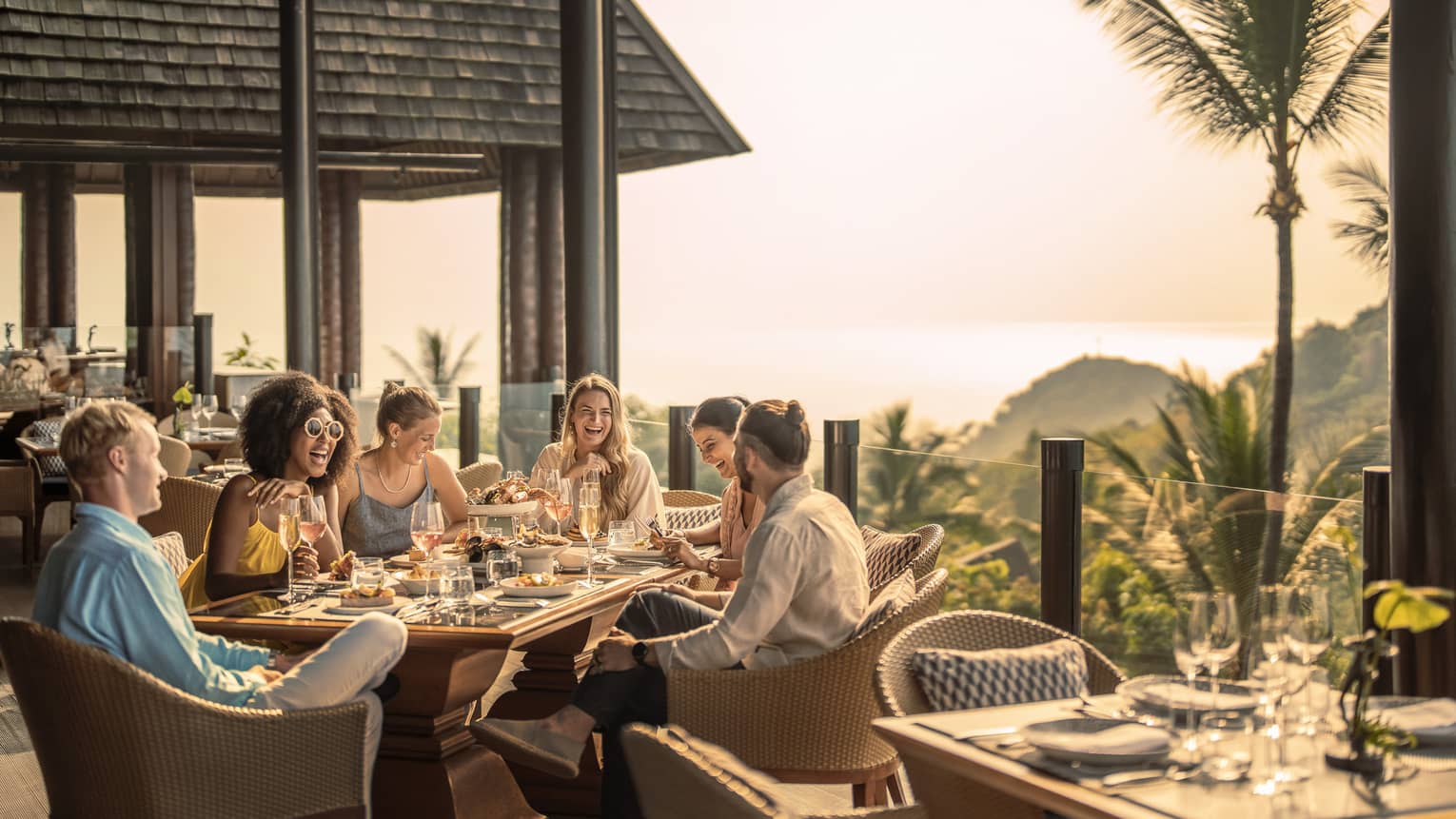 Group of friends enjoys outdoor traditional Thai brunch