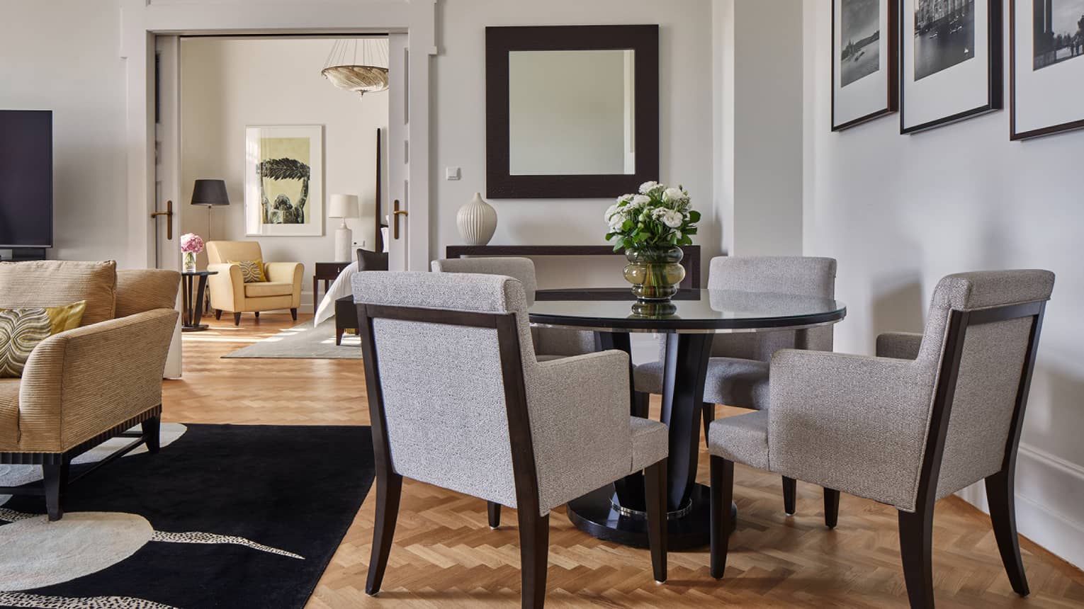 A small round table with four chairs.