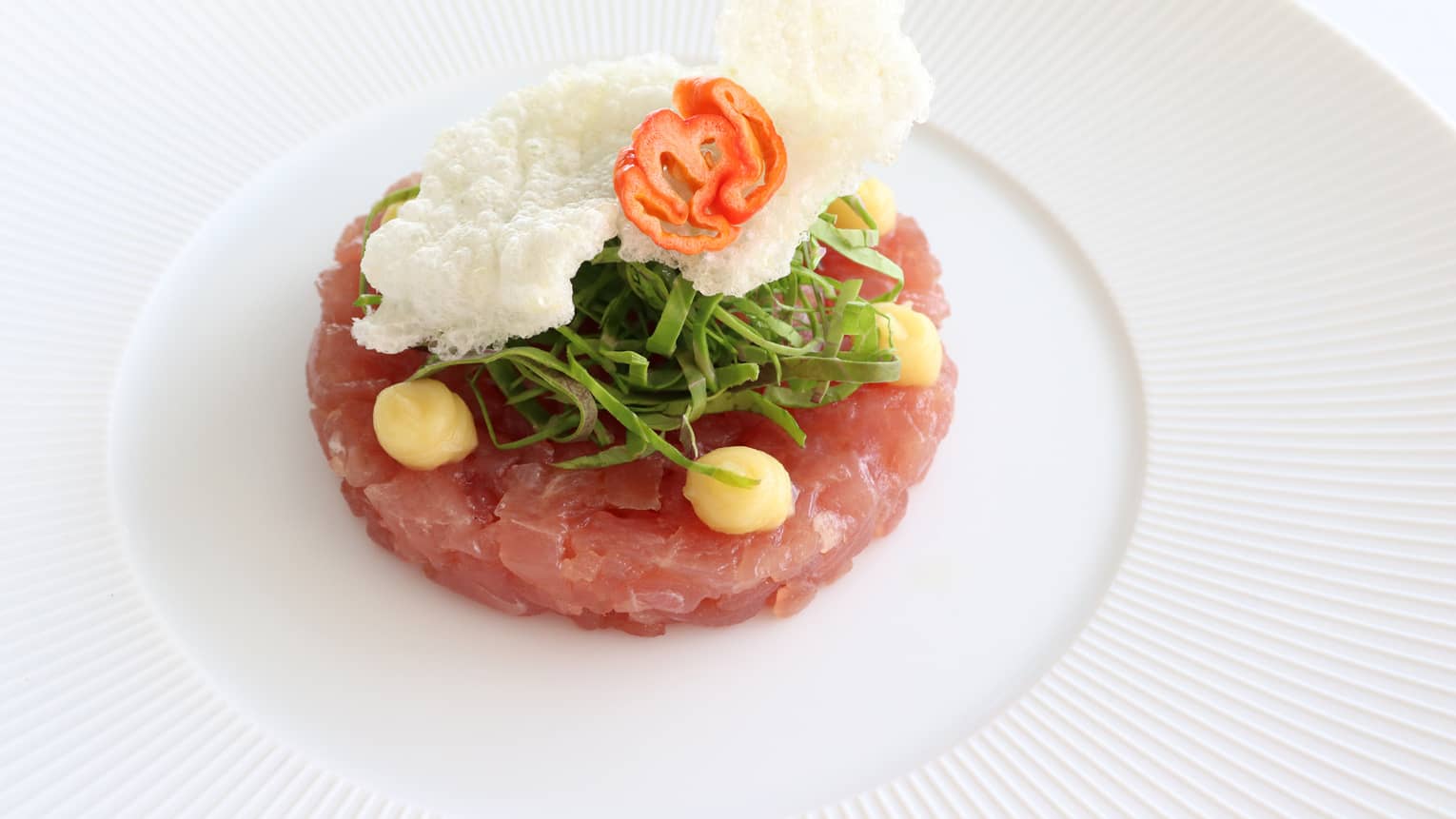 Line-caught Tuna Tartare with Maldivian Chilli, Roasted Lemon and Kopi Leaf