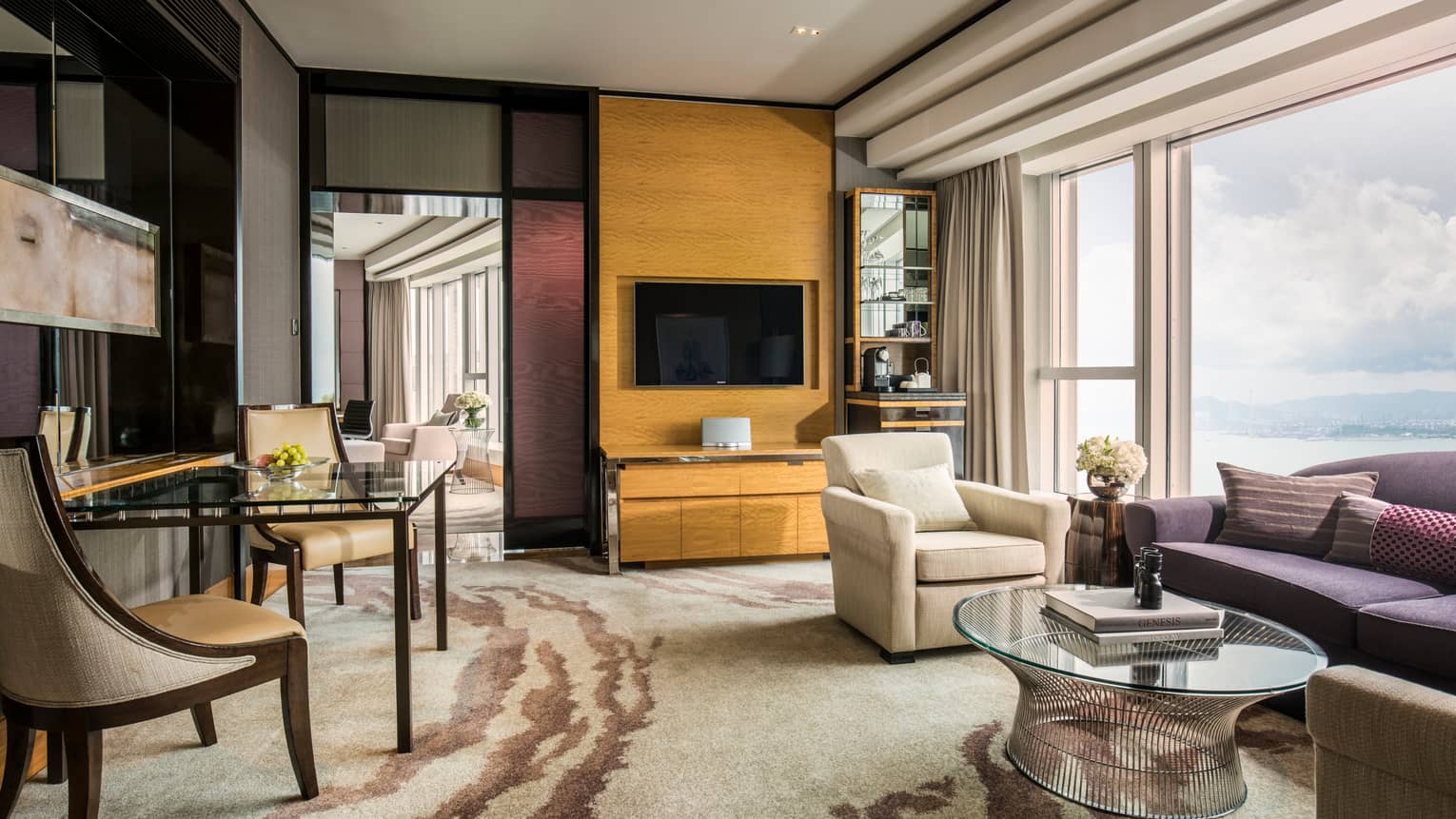 Grand Harbour-View Suite spacious living room and door to dining room, floor-to-ceiling windows with harbour views