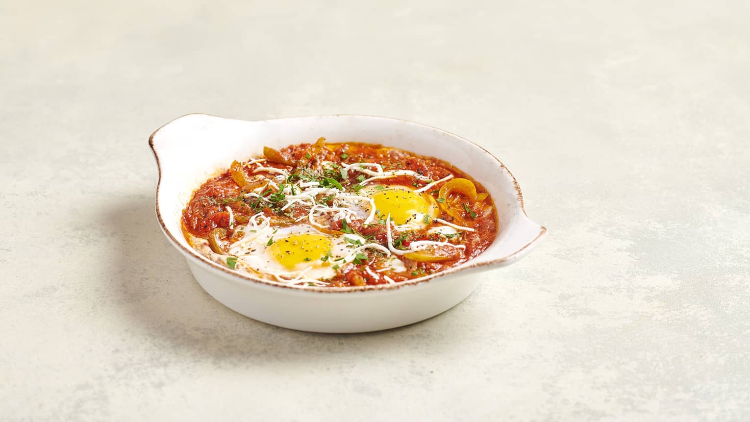 Poached Eggs, Spicy Tomato Sauce, Capsicum, Parsley