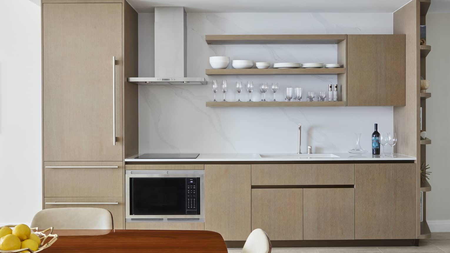 Kitchen with fridge, oven, sink and open shelves