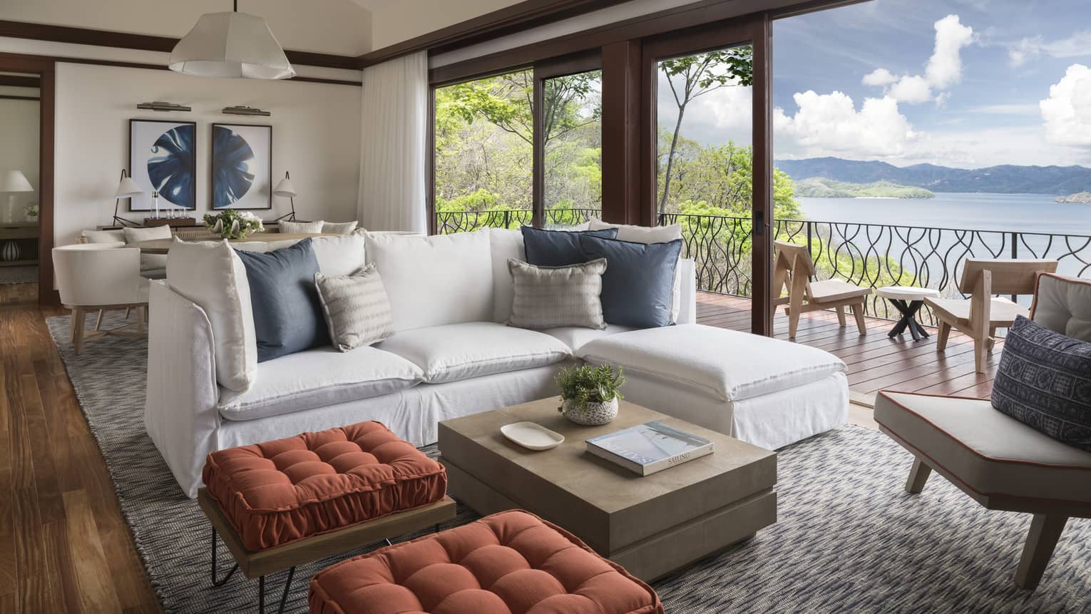 Three-Bedroom Residence Villa with Plunge Pool living room with white L-shaped sofa, ottomans by open patio door