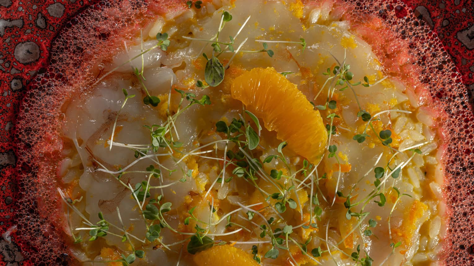 Prawn Ceviche Garnished with Orange Segments and Micro Greens