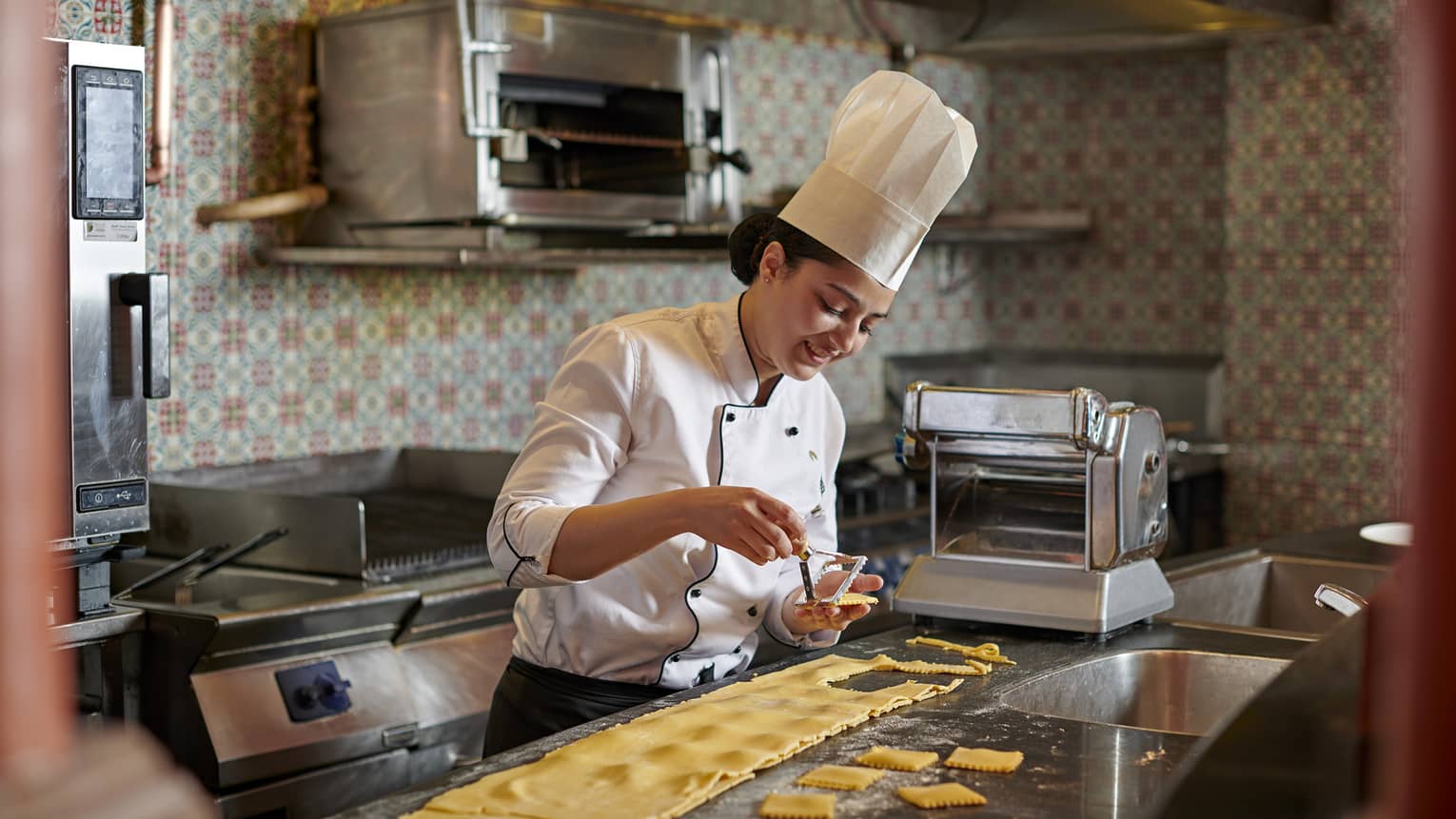 Female chef makes fresh pasta at Stefano's