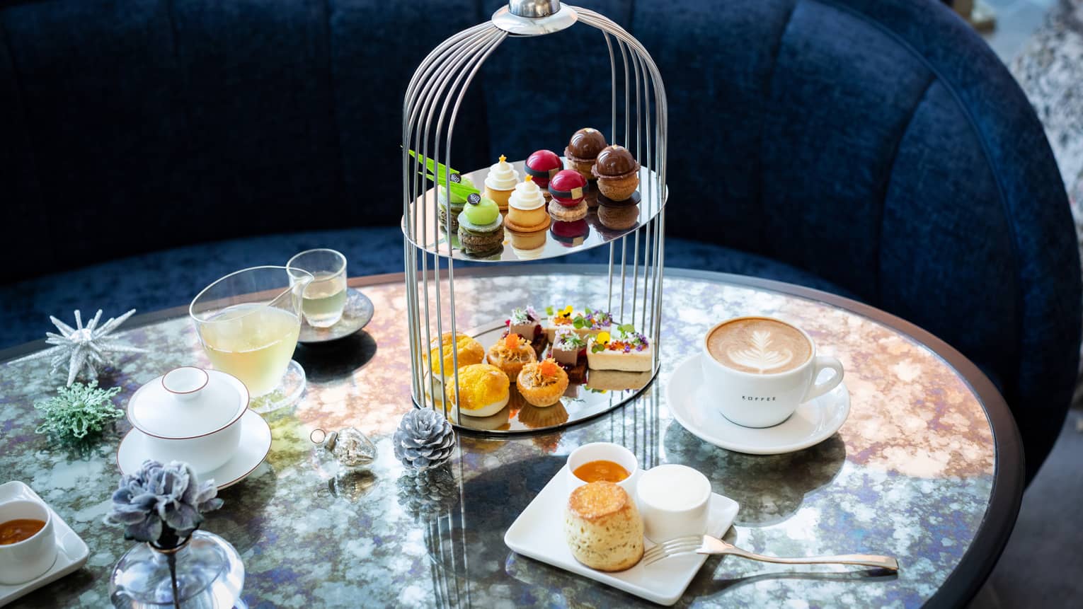 Holiday Afternoon Tea tower with sweets, coffee and tea