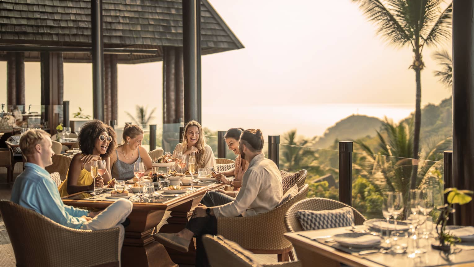Group of friends enjoys outdoor traditional Thai brunch