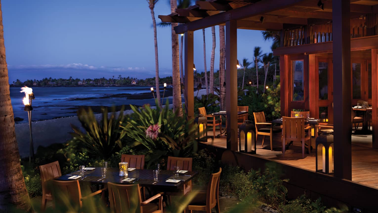ULU Sushi Lounge dining patio near beach at dusk