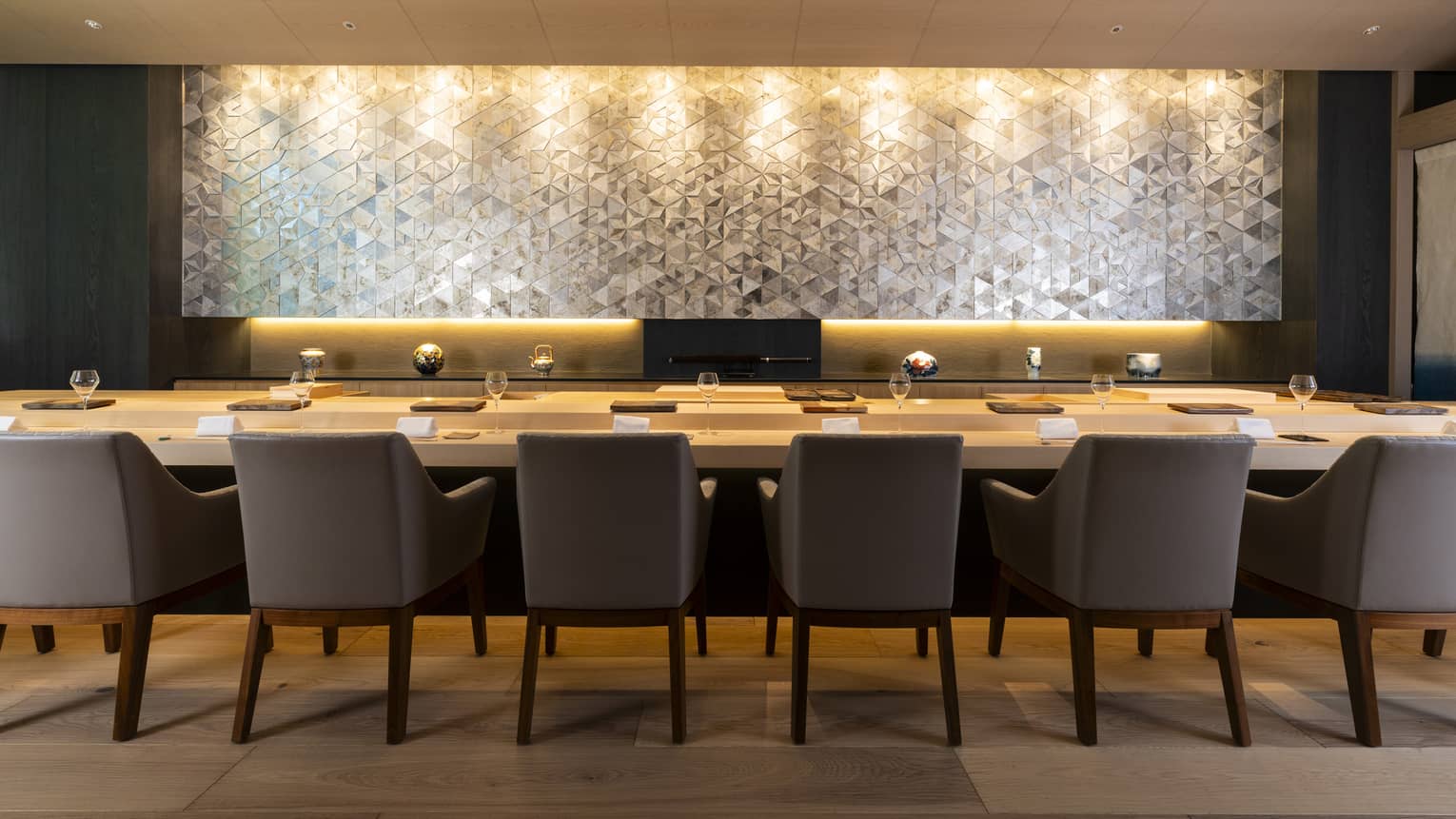 Elegant interior of Sushi Ginza Onodera with a traditional sushi counter
