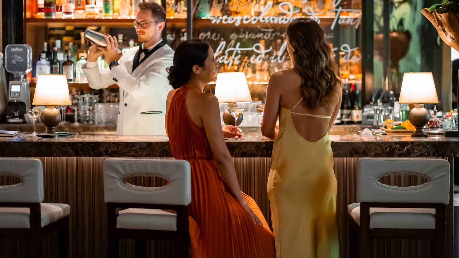 Two women at luxury hotel bar